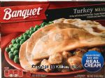 Banquet  turkey meal; with gravy and dressing, creamy mashed potatoes and sweet peas Center Front Picture