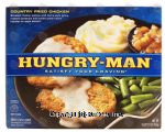 Hungry-Man  country fried chicken, with home-style gravy, mashed potatoes and green beans, w/ an apple dessert Center Front Picture